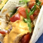Slow Cooker Queso Chicken Tacos
