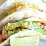 Slow-Cooked Salsa Verde Honey Lime Chicken Tacos